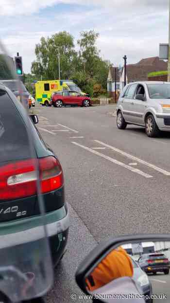 Two people taken to hospital after crash at busy junction