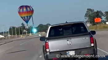 Hot air balloon strikes power lines in Indiana, seriously injuring several passengers