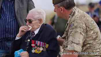 One of the last surviving D-Day veterans weeps on his return to the Normandy beach where he landed 80 years ago as heroes arrive by ferry for landmark commemorations