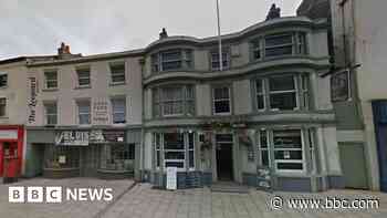 Shop and flats plan for fire-ravaged historic pub