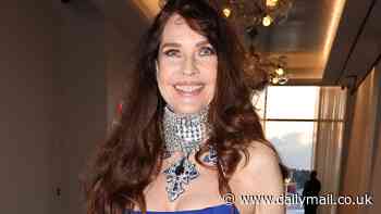 Carol Alt, 63, candidly reveals her gown was tight because she 'gained weight' but she STILL manages to look sensational... 42 years after SI cover