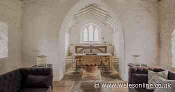 This beautiful converted ancient church comes with a font in the living room