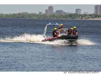 Fire service rescue squad saves two paddle boards stuck in fast-moving Deschênes Rapids