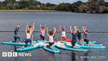 Yoga teacher runs classes on paddleboards