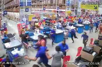 Horrifying moment 50ft tall supermarket shelves topple over and kill worker