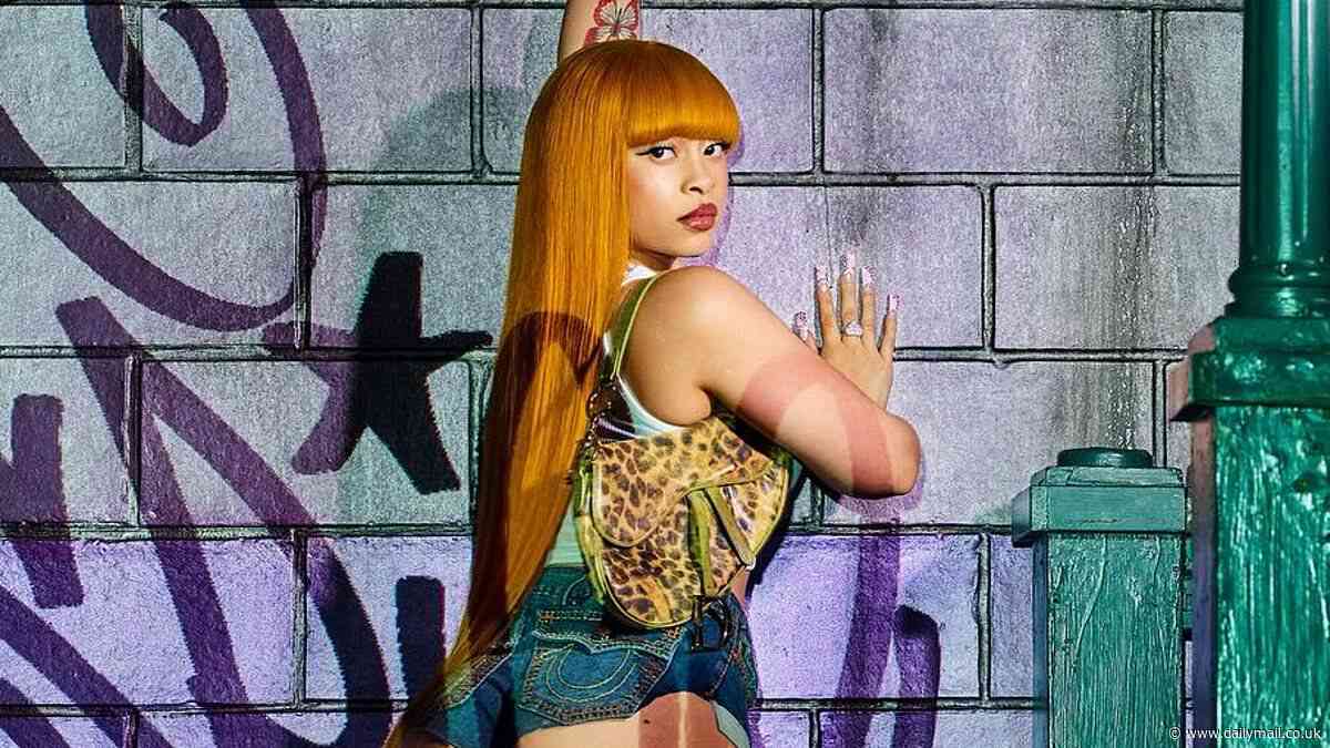 Ice Spice gets cheeky as she displays ample derriere on racy Y2K album cover and announces world tour