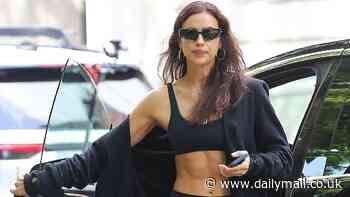 Irina Shayk shows off toned abs in black sports bra and leggings after gym session in New York City
