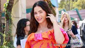 Pregnant Jenna Dewan showcases her baby bump in a bright summer dress as she attends Jeremy Scott's Cybex launch party in West Hollywood