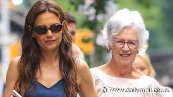 Katie Holmes holds hands with mother Kathleen as they enjoy some quality time together in NYC
