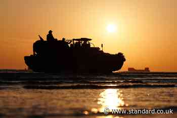 In Pictures: Sun rises across Normandy beaches on D-Day 80th anniversary