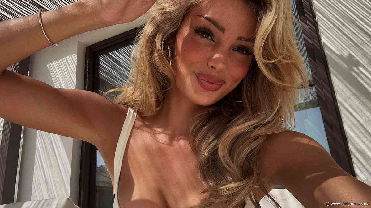 Jude Bellingham's new girlfriend Laura Celia Valk puts on a VERY busty display in plunging bikini as she shares sun kissed snaps