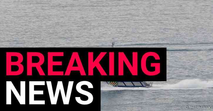 Boat with 80 migrants including children capsizes in the Channel