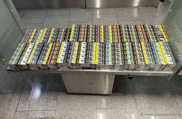 HZA-D: Ein Koffer voller Zigaretten - und einem Pullover / Zoll Düsseldorf findet 12.400 Zigaretten im Reisegepäck