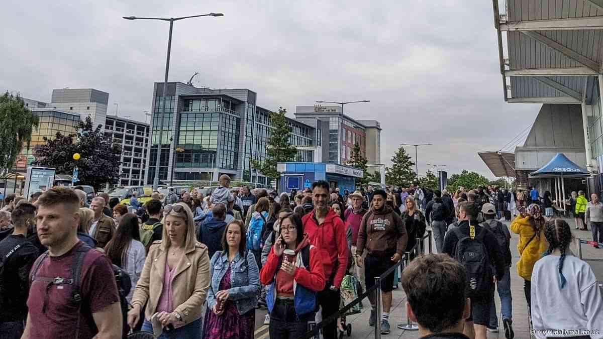 Huge queues form outside Birmingham Airport as furious passengers slam scenes of 'carnage'