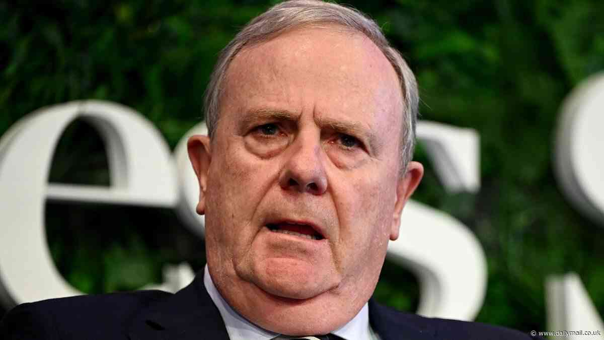 Moment Channel Nine chairman Peter Costello appears to push over a reporter after confronting him at the airport