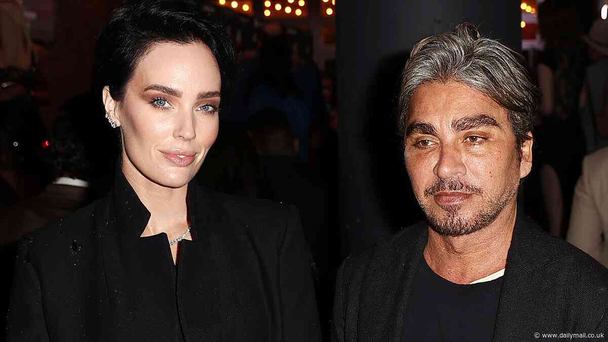 John Ibrahim and fiancée Sarah Budge cut stylish figures in Sydney - after a portrait of the Kings Cross identity was selected as a finalist in the 2024 Archibald Prize