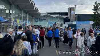 Chaos at Birmingham Airport amid confusion over new 100ml liquid rules: Passengers face long queues