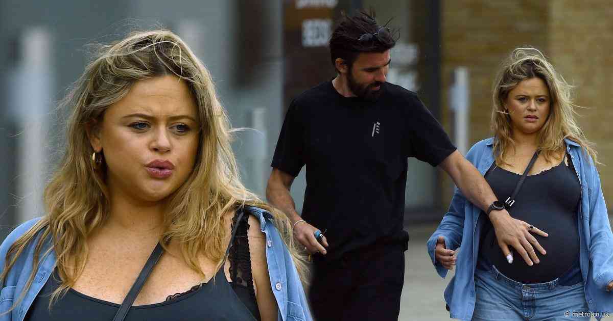 Heavily pregnant Emily Atack supported by partner on stroll ahead of baby’s arrival