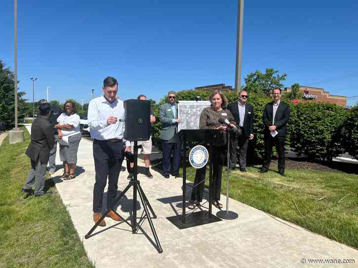 City officials celebrate the completion of the Summit Park Trail and Sidewalk Project