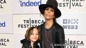 Linda Perry shows off her rock n' roll style as she's joined by son Rhodes, nine, at the premiere of her documentary Let It Die Here in NYC