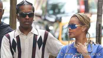 Rihanna shares a sweet moment with baby daddy A$AP Rocky as the couple step out in NYC without their two sons