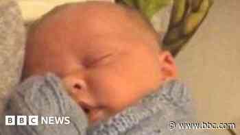 Baby murder accused 'seen swinging his arms' in flat