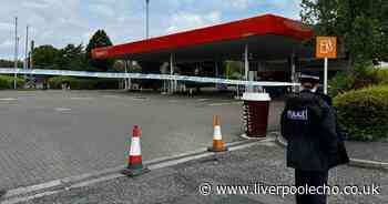 Police surround Sainsbury's petrol station