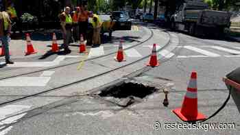 Sinkhole on NW 23rd Avenue disrupts streetcar, other traffic