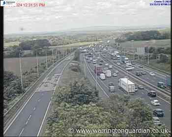 Delays of up to 20 minutes on M6 near Lymm due to broken down vehicle