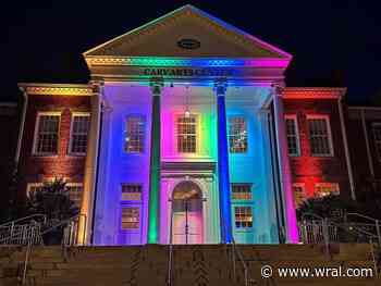 Downtown Cary glowing rainbow colors in honor of Pride Month