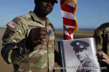 Black D-Day combat medic’s long-denied medal tenderly laid on Omaha Beach where he bled, saved lives