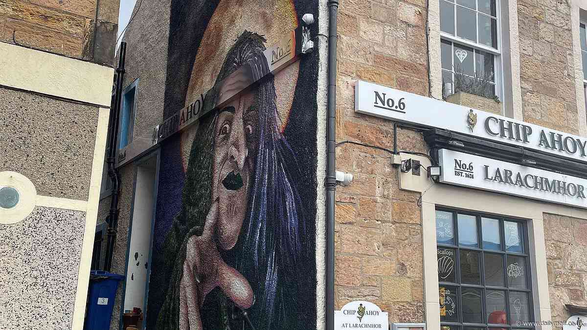 Ex-spelled! Businessman forced to remove 'historically inaccurate' witch mural from side of village pub