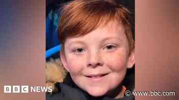 Pair arrested after boy died trying social media craze