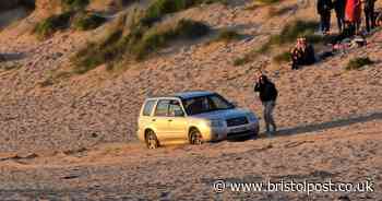 Silly season in Cornwall kicks off as car gets stuck on beach
