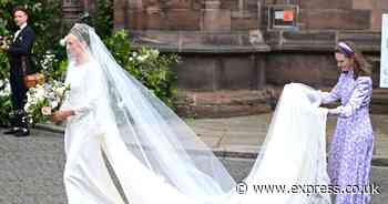 Duke of Westminster wedding crowd gasps as Olivia Henson suffers wardrobe mishap