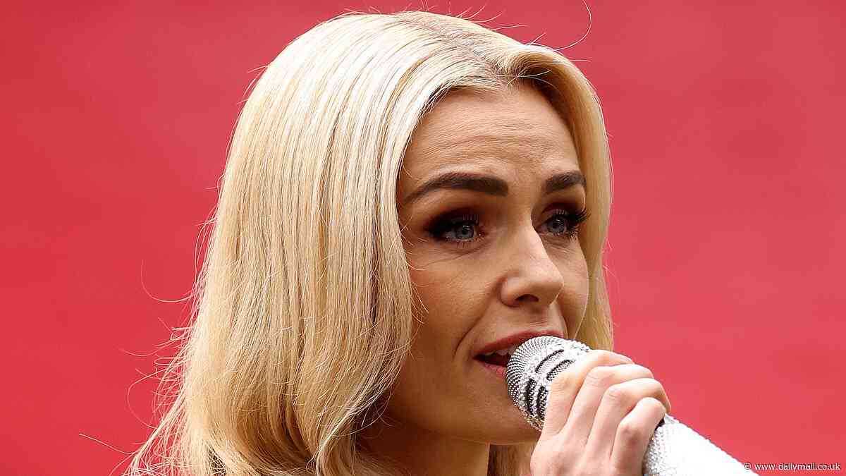 Katherine Jenkins looks beautiful in yellow as she sings the national anthem at the Women's Challenge Cup Final between St Helens and Leeds Rhinos