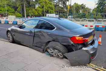 BMW badly damaged after crash in city centre