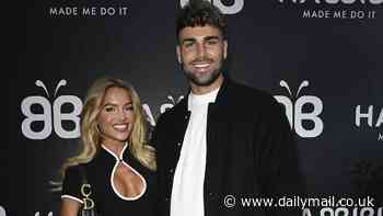 Love Island's Molly Smith puts on a leggy display in a black minidress as she brings boyfriend Tom Clare to restaurant launch