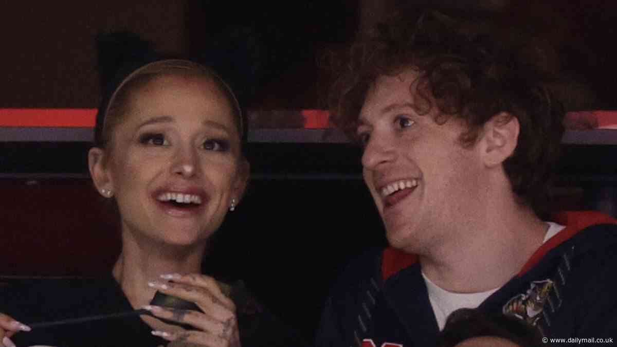 Ariana Grande laughs with Wicked boyfriend Ethan Slater at game one of Stanley Cup Final... after she released video for her song The Boy Is Mine rumored to be about him