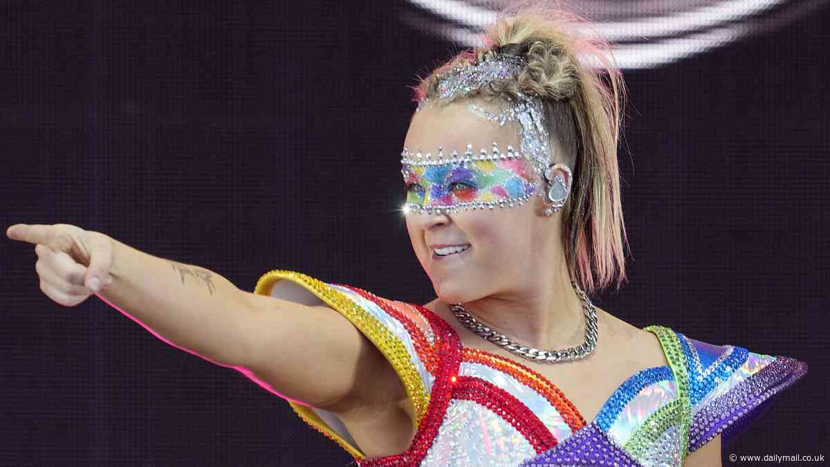 JoJo Siwa chugs from Tito's vodka bottle onstage at LA Pride In The Park weeks after 21st birthday... in wake of THAT 'gay pop' controversy