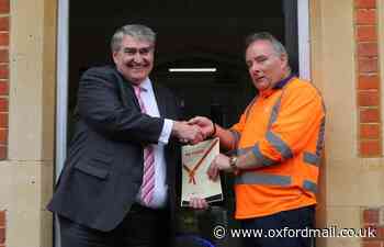Bicester street cleaning operative gets long service award