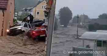 Alarm om zware overstromingen in Oostenrijk: auto's meegesleurd, tientallen mensen gered