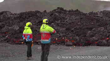 Iceland: Lava flow engulfs road as it advances towards coastal town after volcano eruption