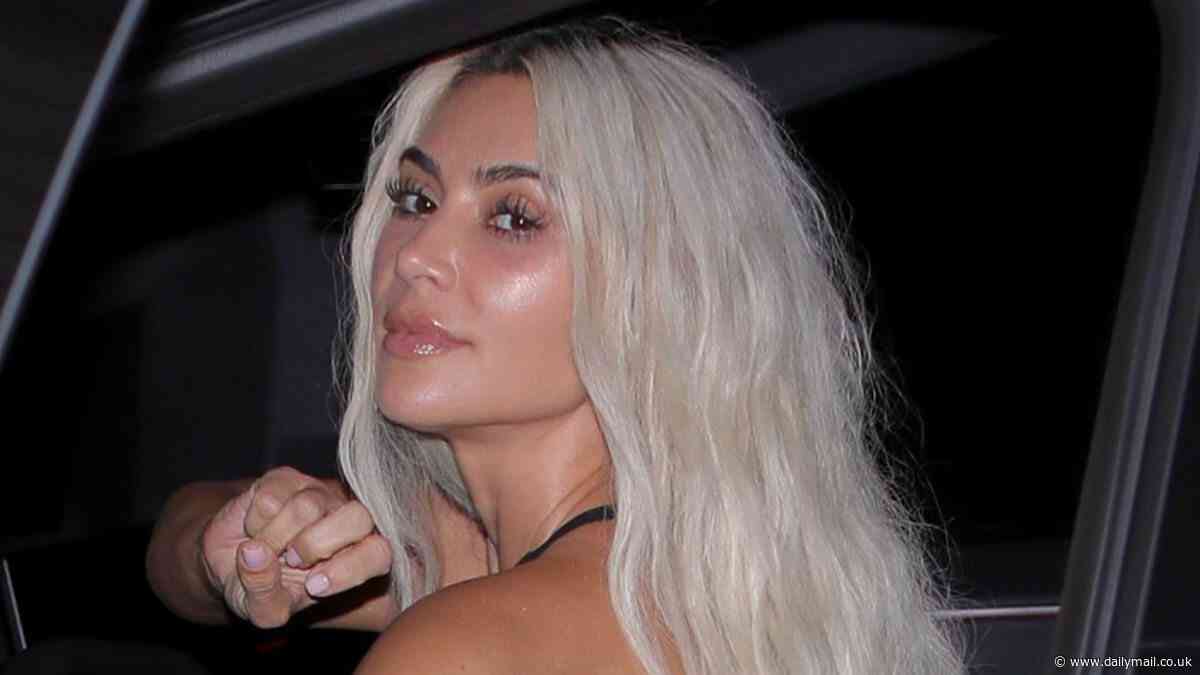 Kim Kardashian looks incredible in a plunging halterneck bodysuit and leather trousers as she steps out of a Tesla Cybertruck in LA