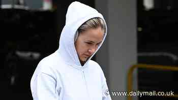 Molly-Mae Hague goes make-up free as she steps out in a casual grey jogging set in Manchester - after reflecting on her 'filler scandal'
