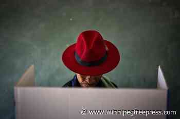 Here’s how an Associated Press photographer found the extraordinary in a red hat