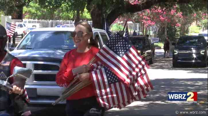 Residents gather in Downtown Baton Rouge for Flag Week festivities