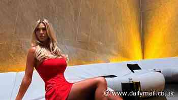 Christine McGuinness puts on a leggy display in a stunning red dress and strappy heels as she prepares for a glam night out in London