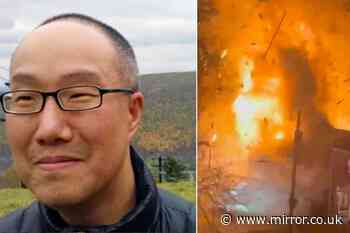 Shocking video shows moment 'reclusive' conspiracy theorist blew up home while still inside