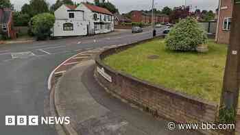 Man dies after car crashes into wall
